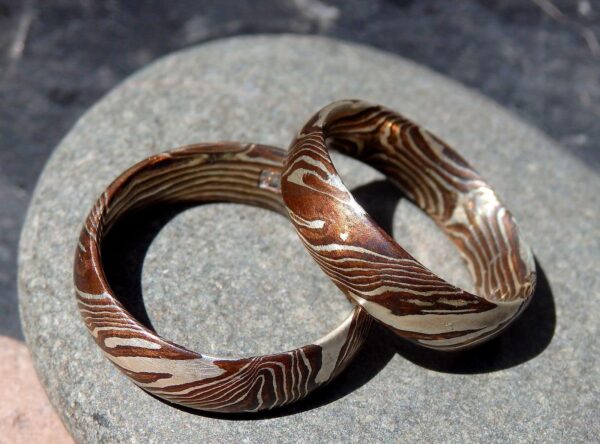 Trauringe Mokume Gane Shakudo Shibuichi Silber Holzmaserung